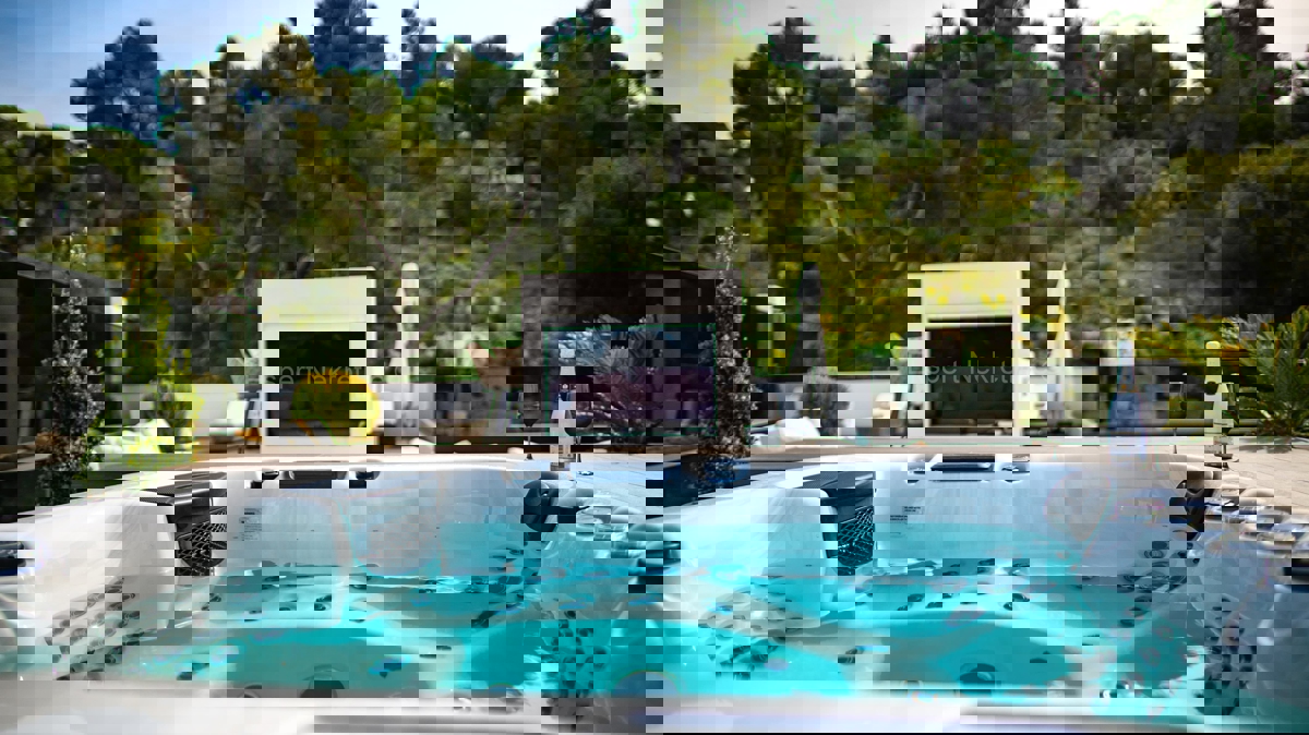 Trogir, luxury villa 312 m2, with swimming pool and garage and landscaped garden