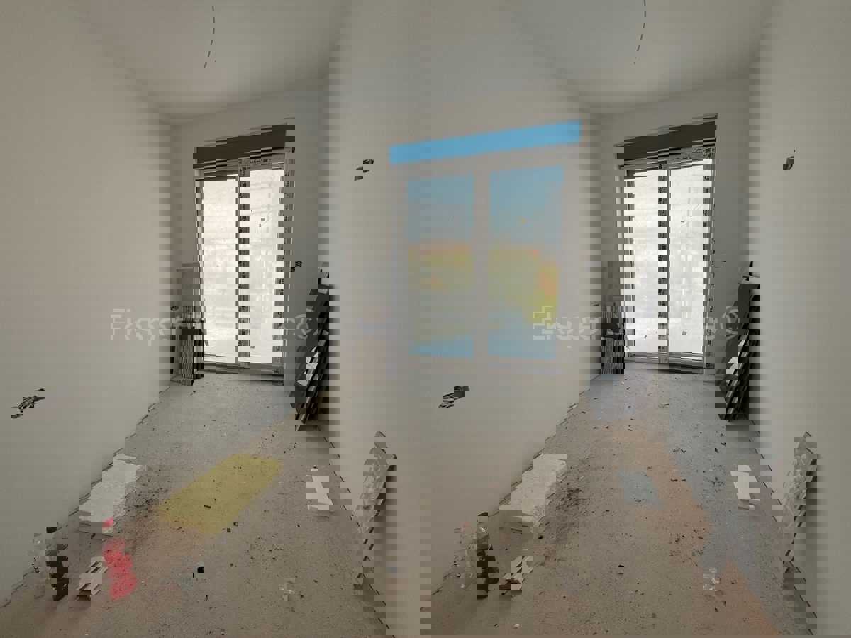 Čiovo,Okrug G., appartamento di 2 locali 64,6 m2 al primo piano di una nuova costruzione, esterno PM