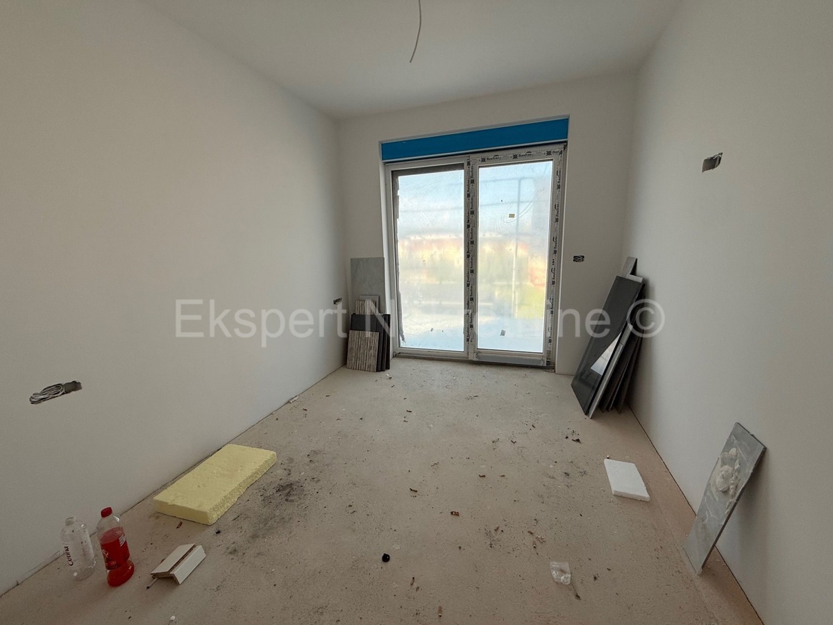 Čiovo,Okrug G., appartamento di 2 locali 64,6 m2 al primo piano di una nuova costruzione, esterno PM