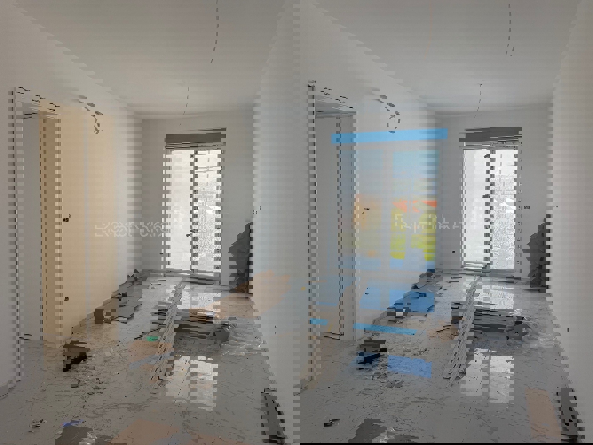 Čiovo,Okrug G., appartamento di 2 locali 64,6 m2 al primo piano di una nuova costruzione, esterno PM