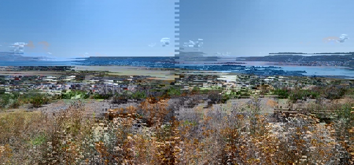 Trogir, Plano, agricultural land 3296 m2, sea view, road