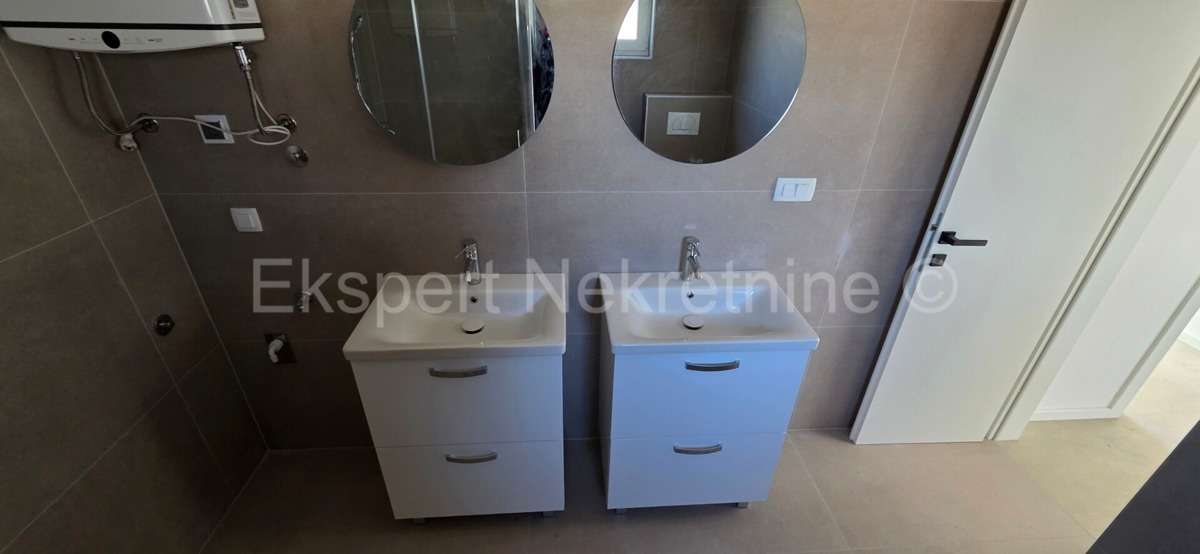 Seget Vranjica, appartamento di 3 locali 129 m2 con vista mare, di nuova costruzione