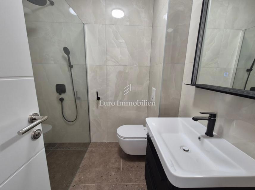 Appartamento con giardino, vicino alla spiaggia