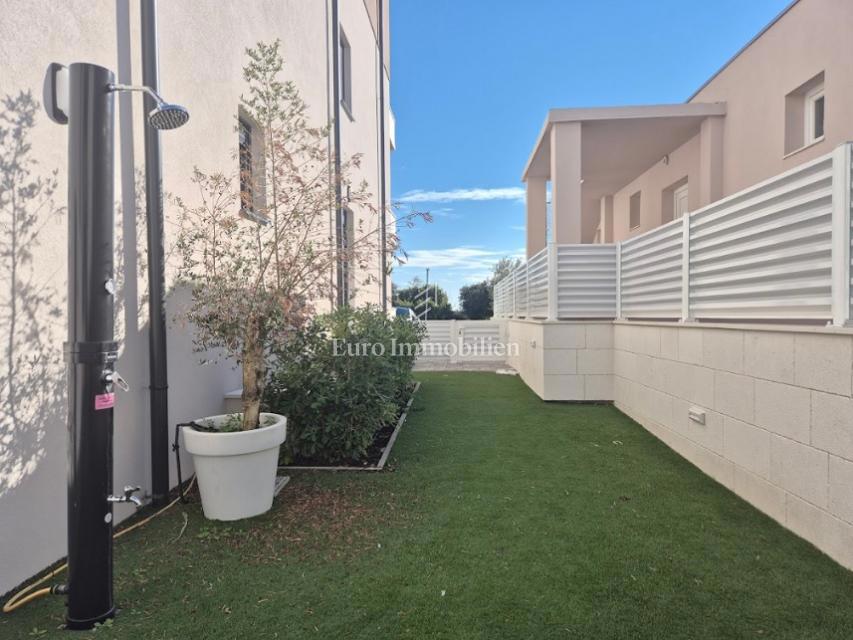 Appartamento con giardino, vicino alla spiaggia