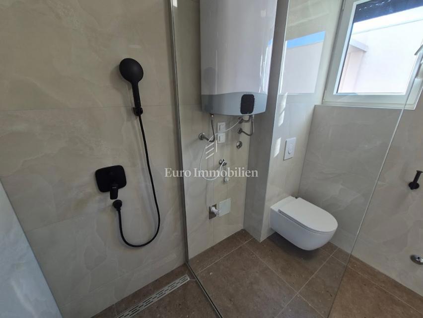 Appartamento con giardino, vicino alla spiaggia