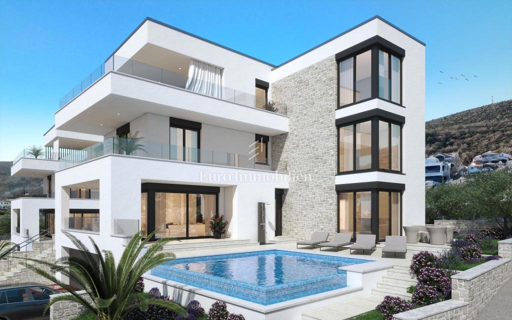 Villa con piscina a sfioro, seconda fila sul mare - Vinjerac