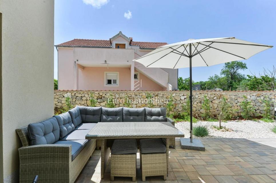 Two-story apartment with a pool in a quiet location