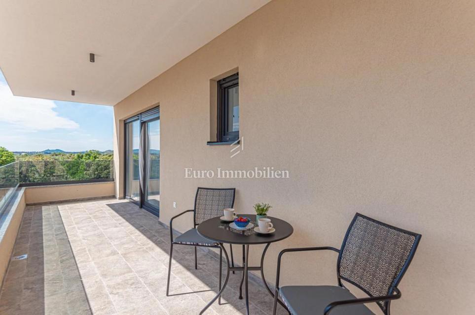 Two-story apartment with a pool in a quiet location