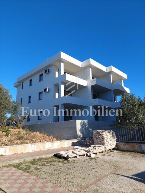 Apartment in a new building in an excellent location 50 m from the sea! Povljana, island of Pag