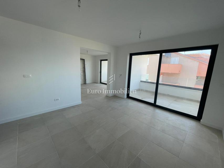 Apartment in a new building in an excellent location 50 m from the sea! Povljana, island of Pag