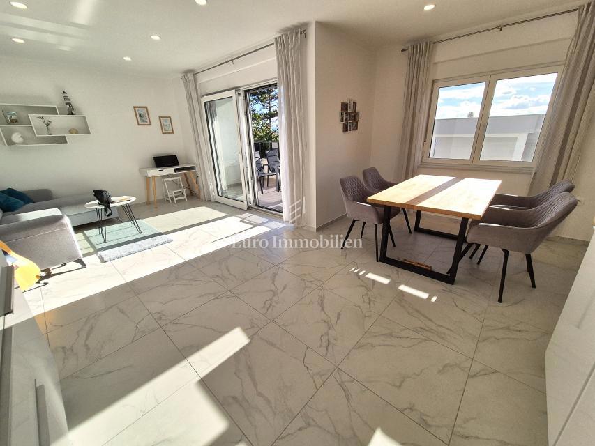 Nuovo edificio con vista mare