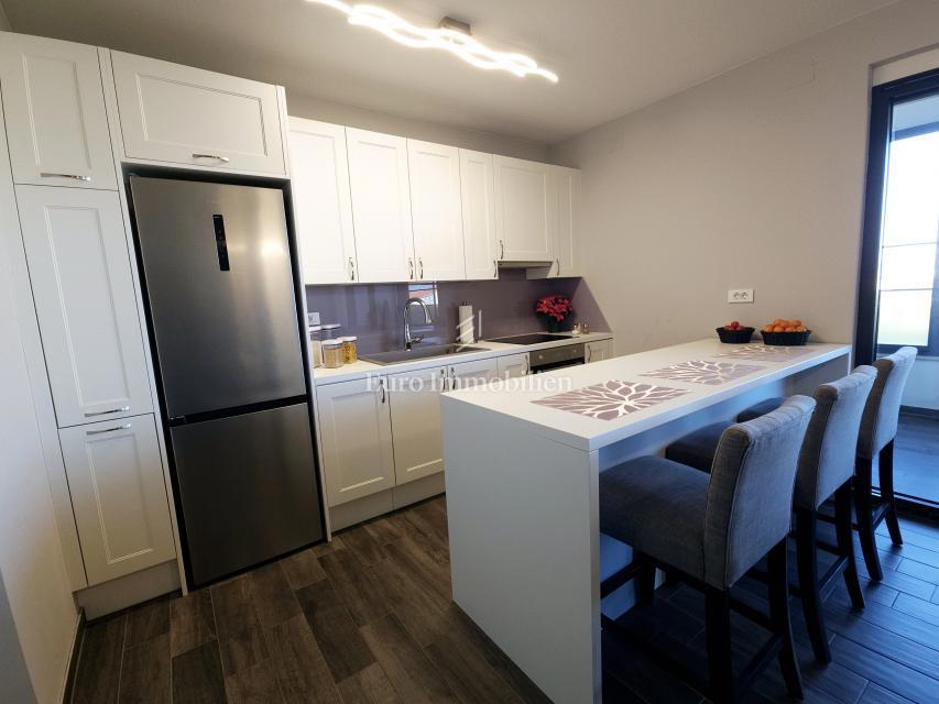 Bilocale funzionale con terrazza coperta