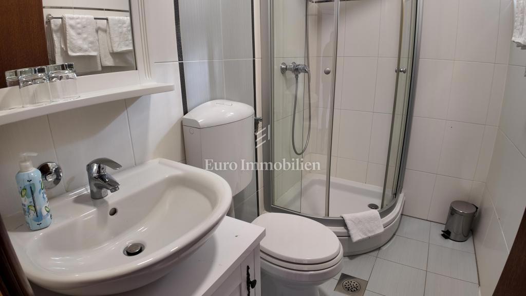 Appartamento con Grande Balcone e Vista Mare