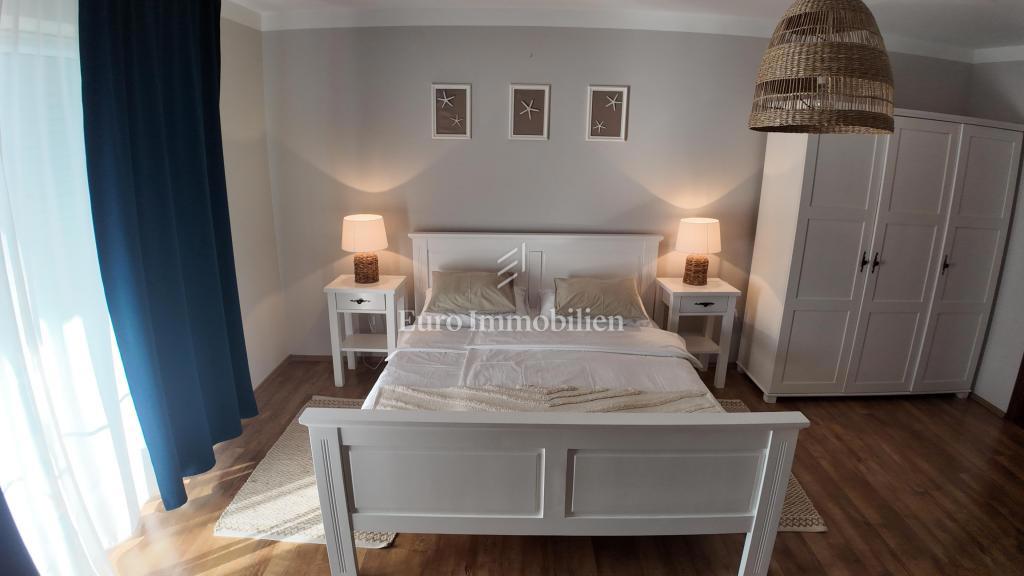 Appartamento con Grande Balcone e Vista Mare