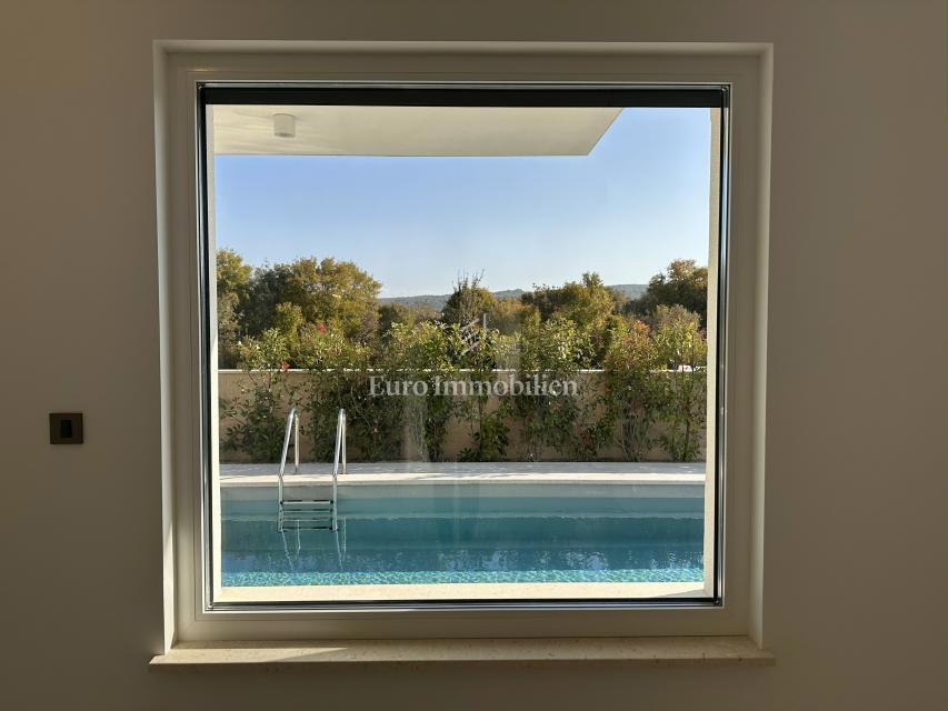 Malinska - casa nuova di qualità con piscina