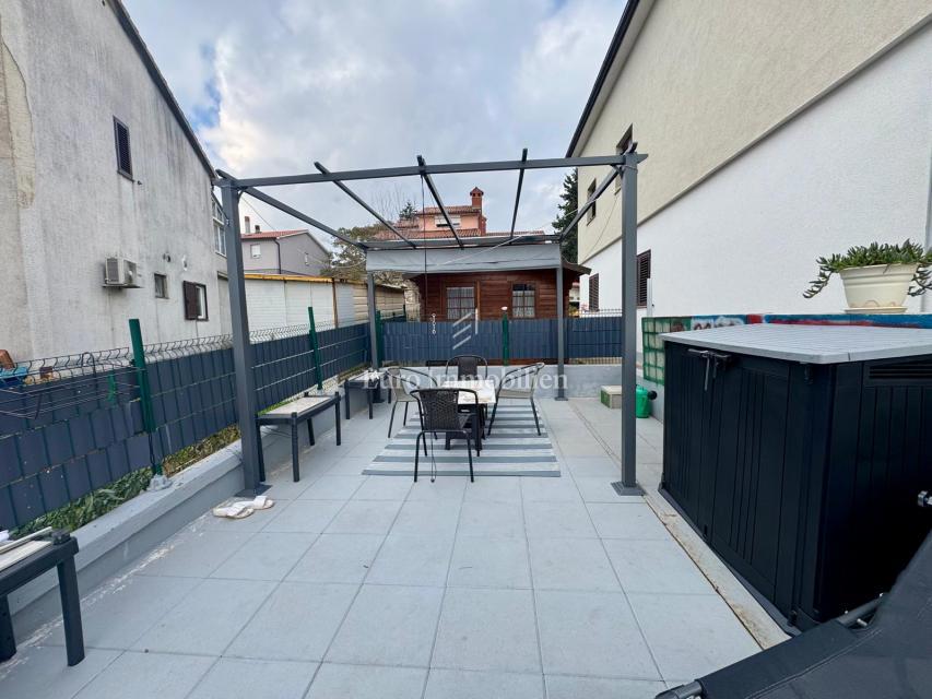 Labin – appartamento con giardino e garage