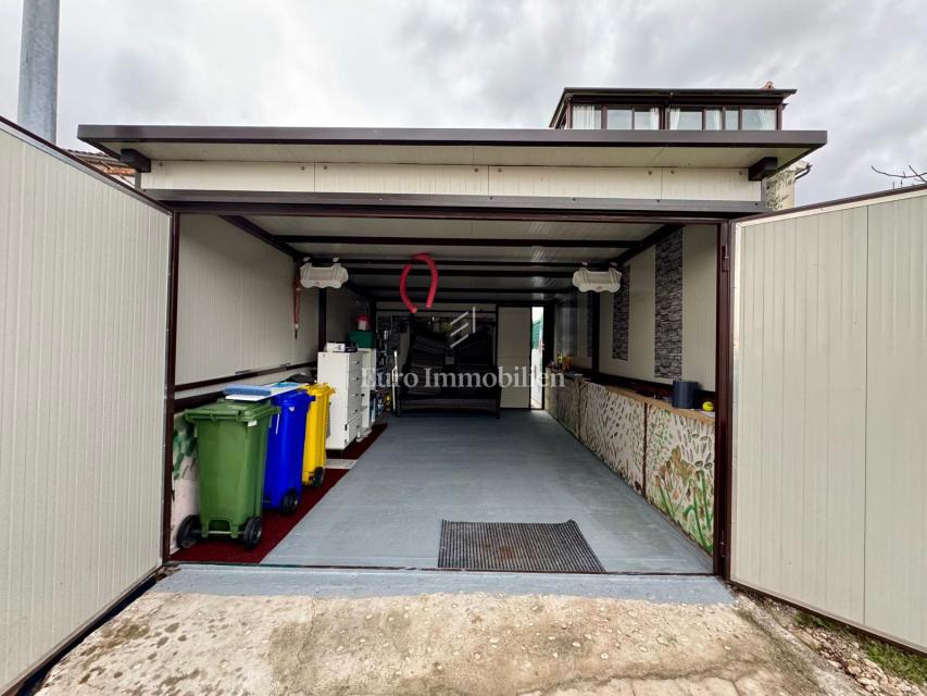 Labin – appartamento con giardino e garage