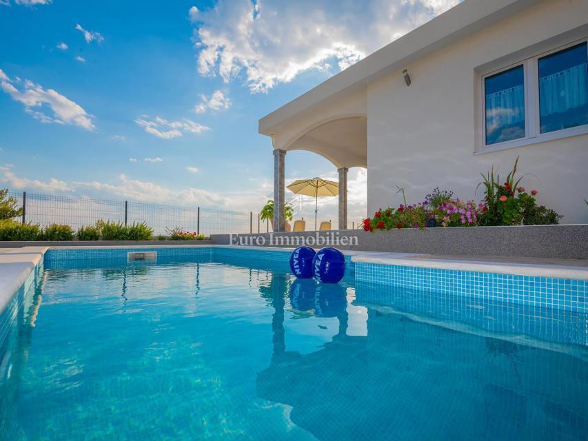 Beautiful villa with a pool and a panoramic view of the sea