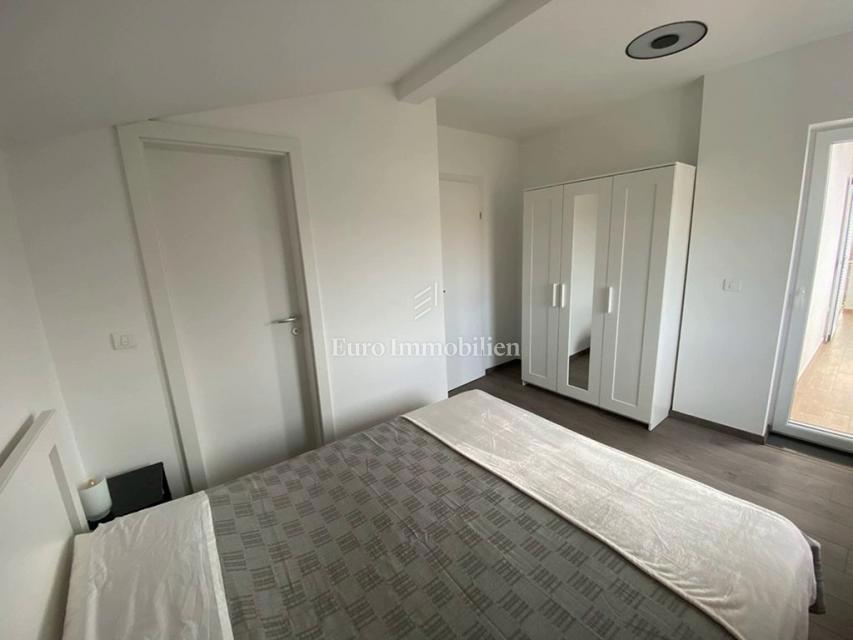 Tisno - Appartamento con giardino e vista mare