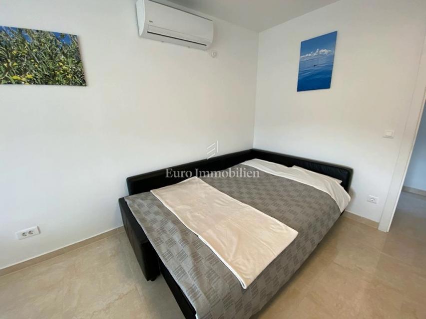 Tisno - Appartamento con giardino e vista mare