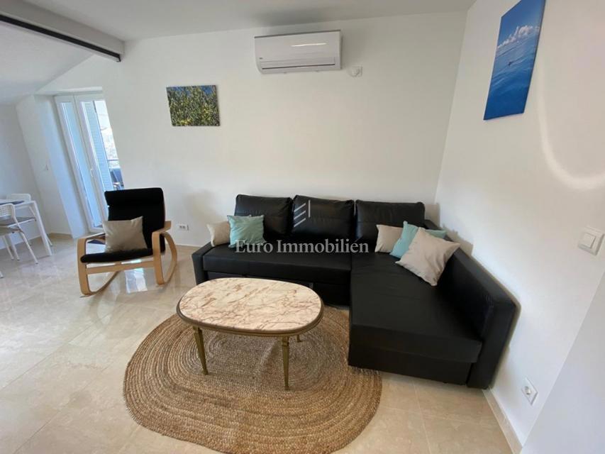 Tisno - Appartamento con giardino e vista mare