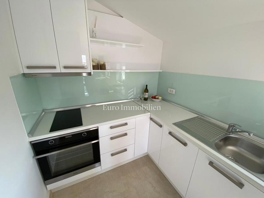 Tisno - Appartamento con giardino e vista mare