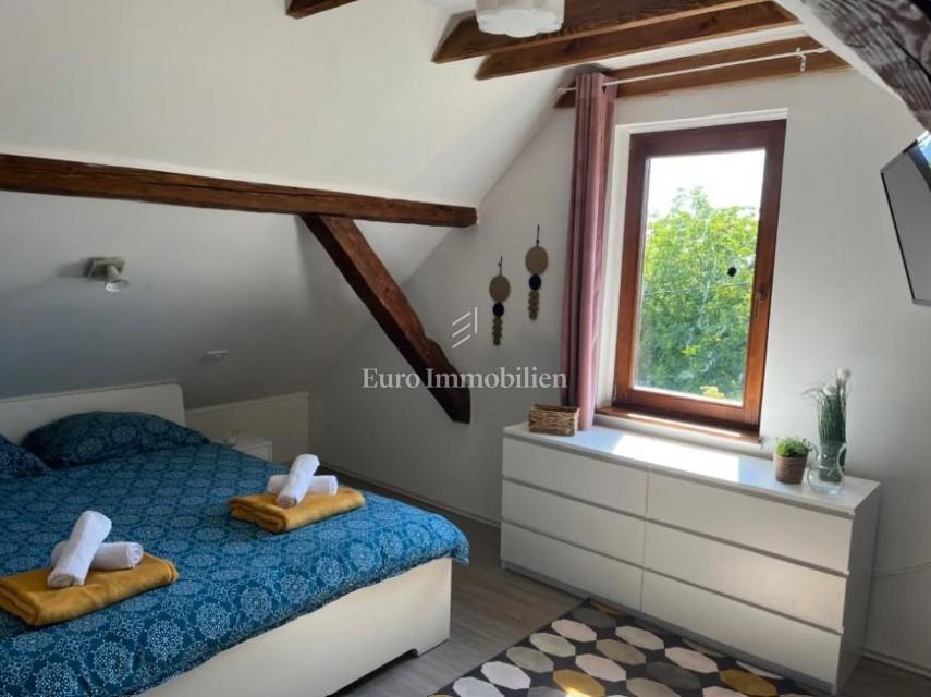 Casa ristrutturata con ampio terreno in zona tranquilla