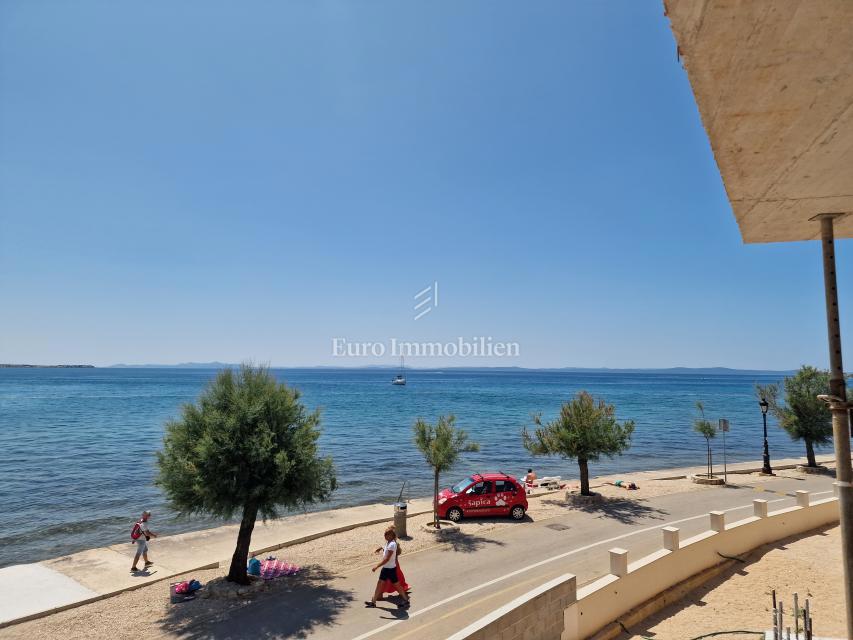 Apartments first row to the sea, new building Vir