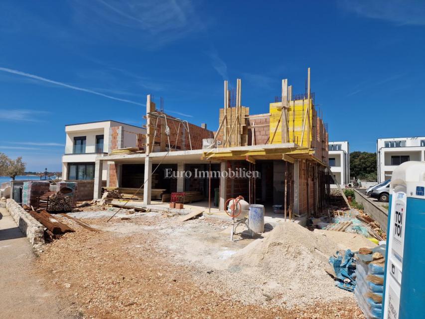 Apartments first row to the sea, new building Vir