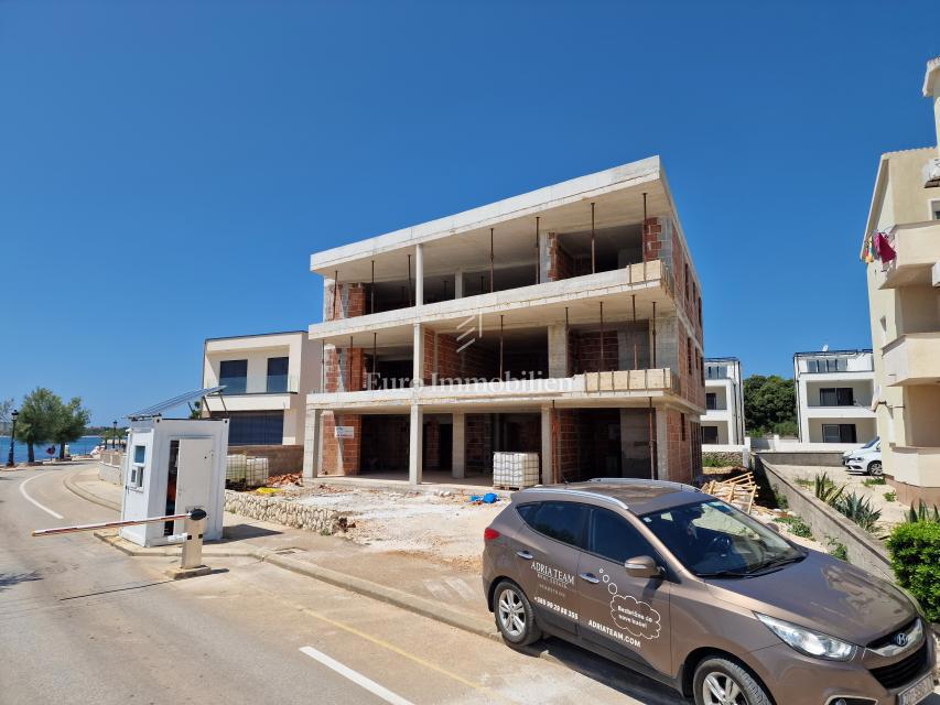 Apartments first row to the sea, new building Vir