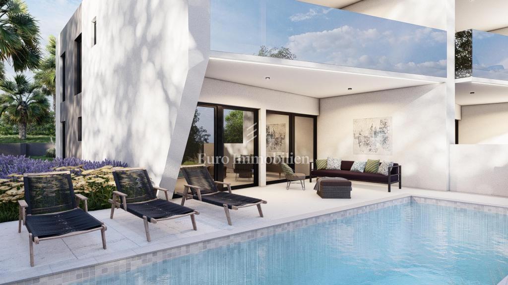 Jadranovo, casa bifamiliare con piscina in costruzione grezza
