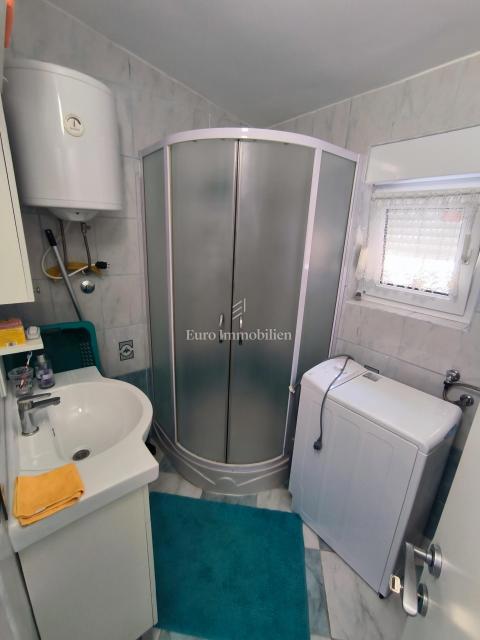 Appartamento con Grande Terrazza e Vista Isole