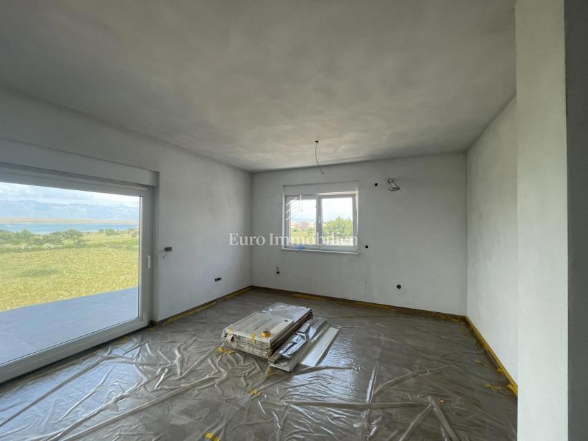 Isola Vir - appartamento di nuova costruzione con giardino