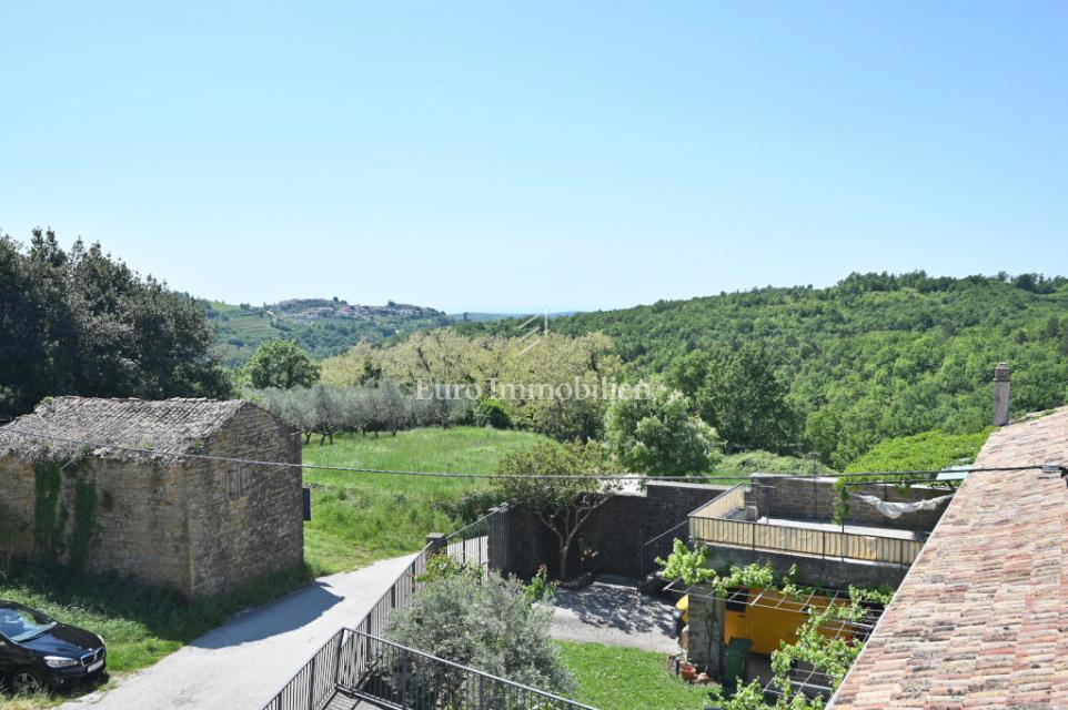 Casa in pietra con vista mare - zona Buie