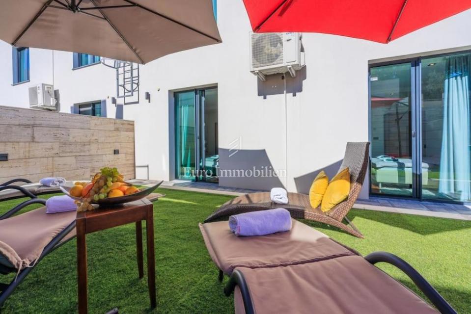 Malinska – Appartamento con giardino, a 250 m dal mare