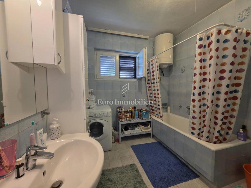 Appartamento con giardino e garage in posizione eccellente