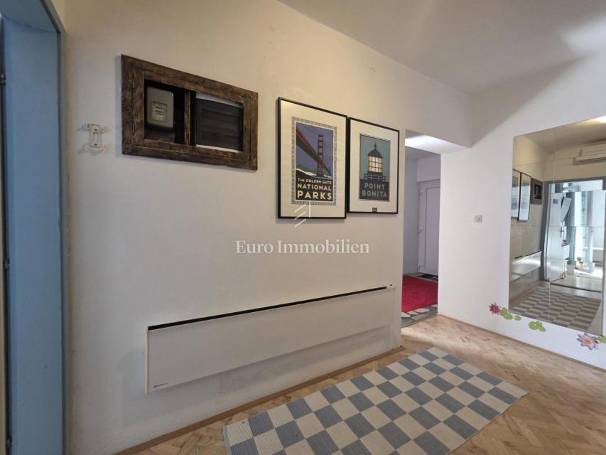 Appartamento con giardino e garage in posizione eccellente