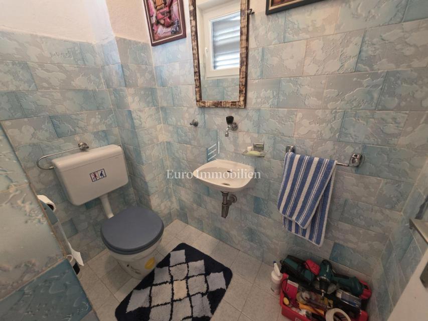 Appartamento con giardino e garage in posizione eccellente