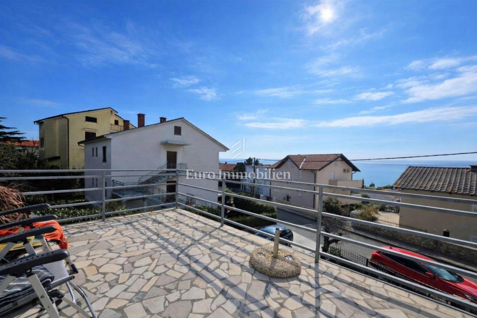 Appartamento con giardino e garage in posizione eccellente