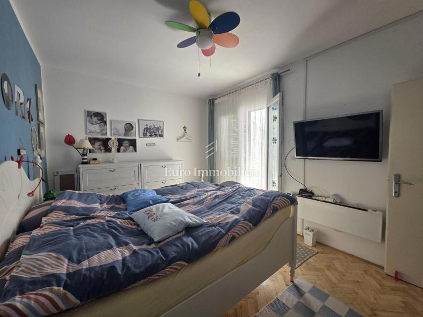 Appartamento con giardino e garage in posizione eccellente