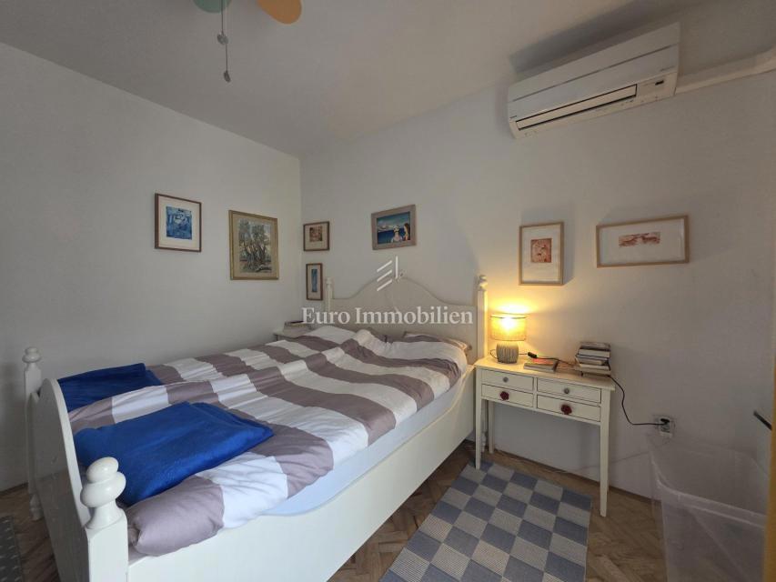 Appartamento con giardino e garage in posizione eccellente