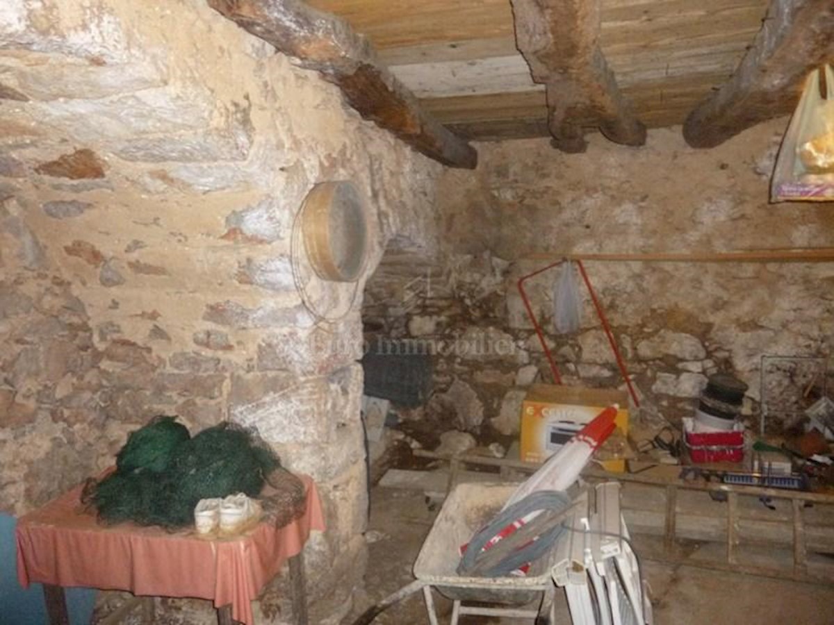 Semi-detached stone house, partially renovated