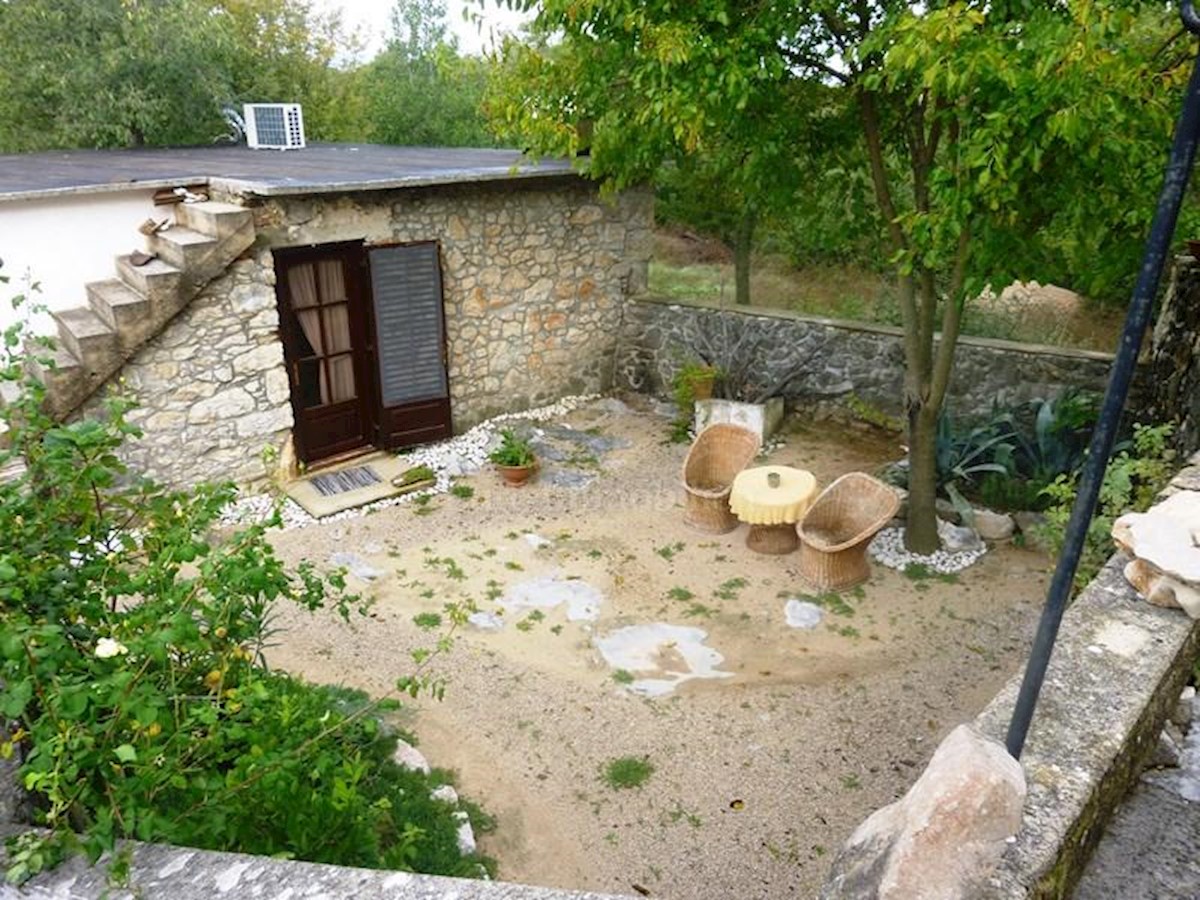 Semi-detached stone house, partially renovated