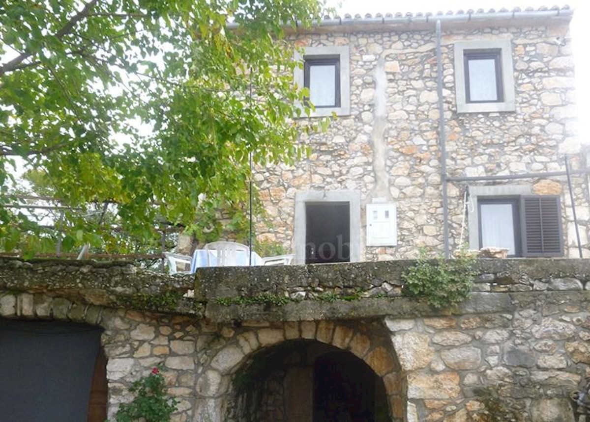 Semi-detached stone house, partially renovated