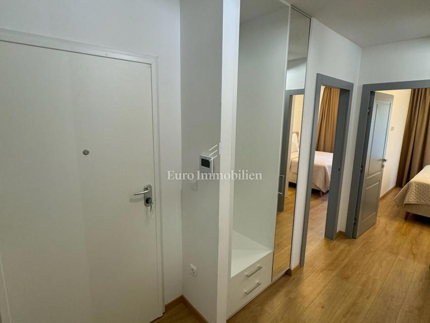 Appartamento di tre stanze con vista mare in un nuovo edificio a Baška Voda