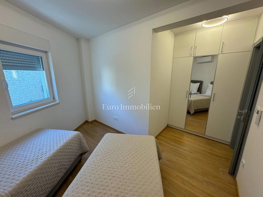 Appartamento di tre stanze con vista mare in un nuovo edificio a Baška Voda
