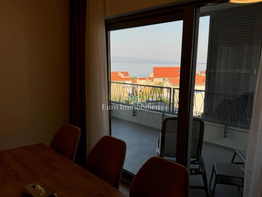 Appartamento di tre stanze con vista mare in un nuovo edificio a Baška Voda
