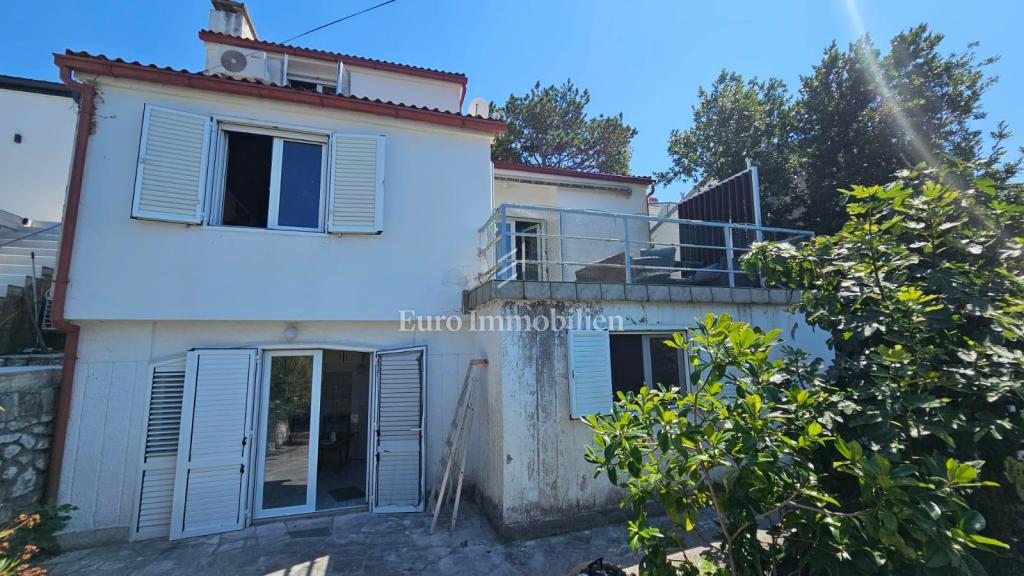 Casa con due unità abitative separate