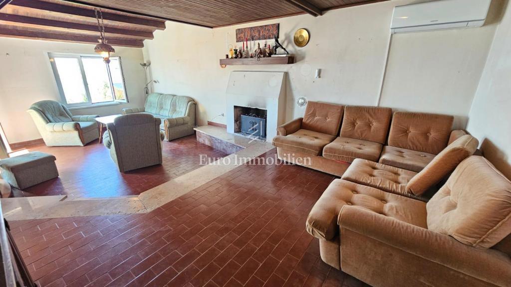 Casa con due unità abitative separate