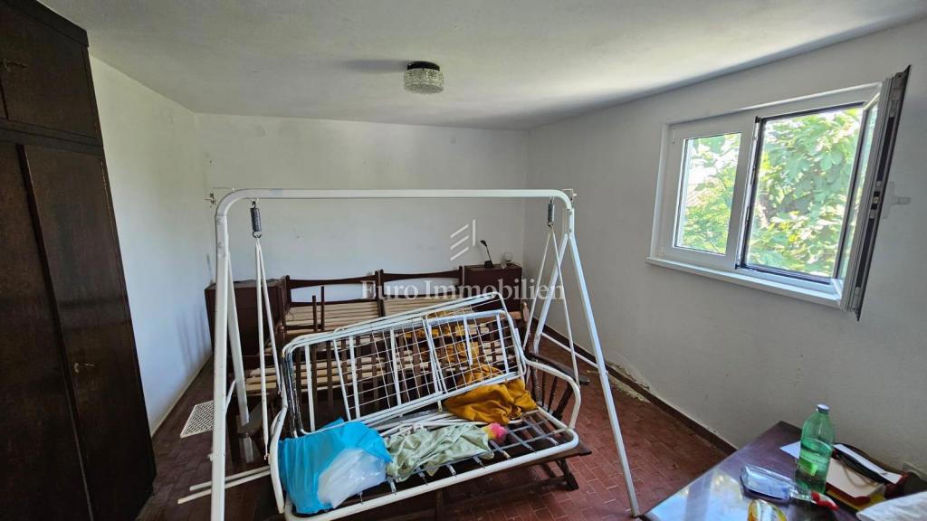 Casa con due unità abitative separate